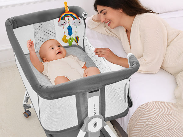 4-in-1 Baby Bassinet Bedside Sleeper — 6-Height Adjustable with Soft Mattress & Soothing Toy